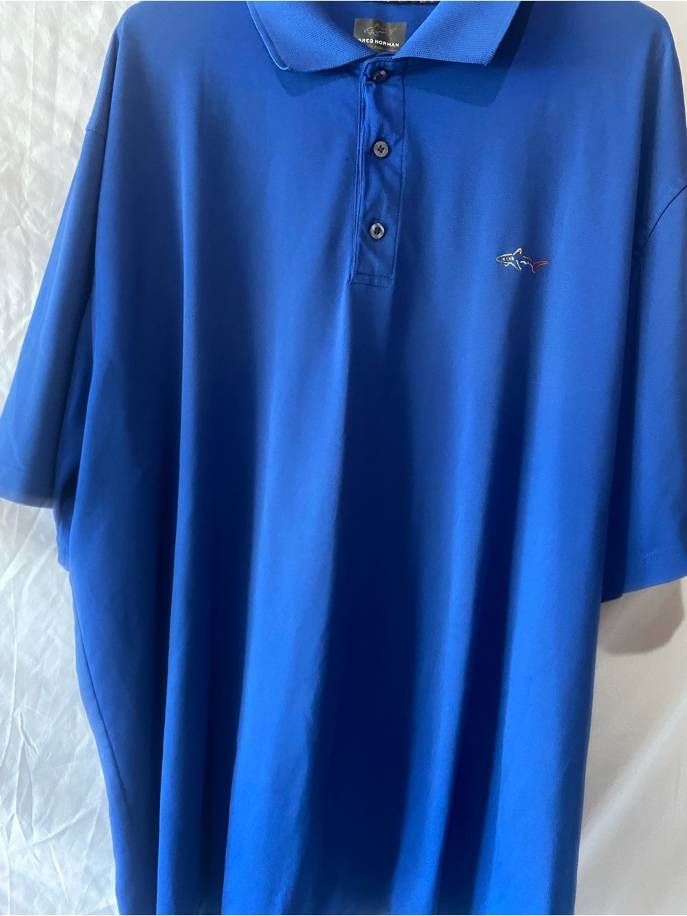 Greg Norman Collection Royal Blue Polo with Small Shark Logo